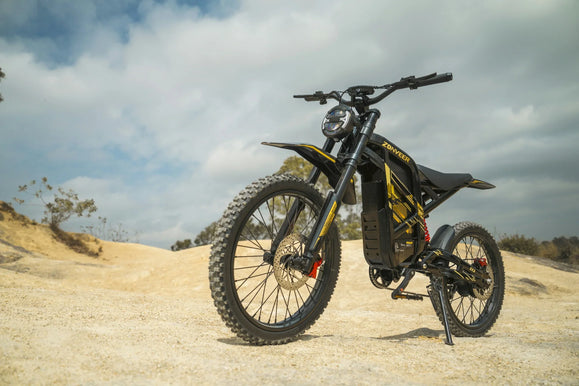 Zonveer ZX3 electric dirt bike standing in open desert for bolt-check guide
